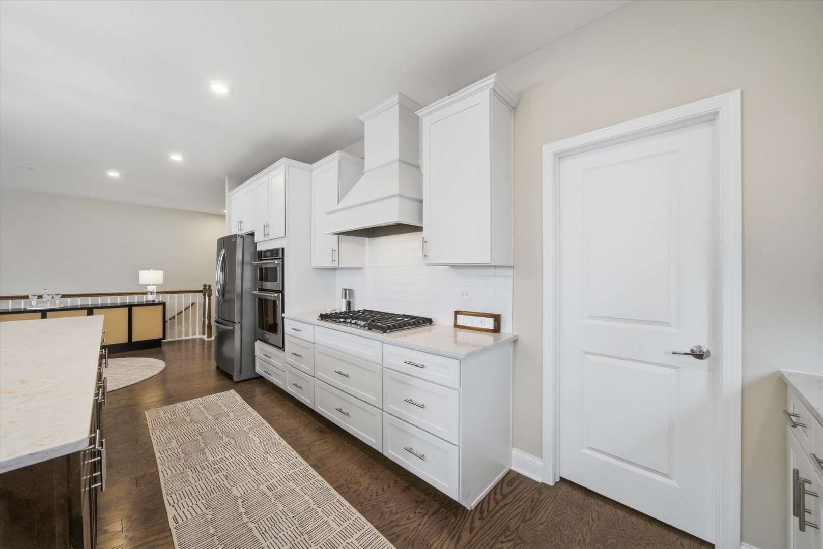 76 Somerset Circle Wheaton, IL 60189 - Photo 15 of 40 a kitchen with stainless steel appliances granite countertop a stove a sink and a refrigerator