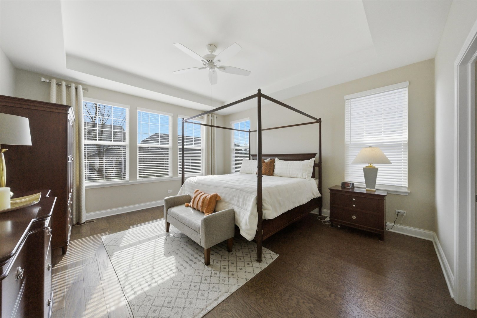 76 Somerset Circle Wheaton, IL 60189 - Photo 22 of 40 a bedroom with a bed couch and window