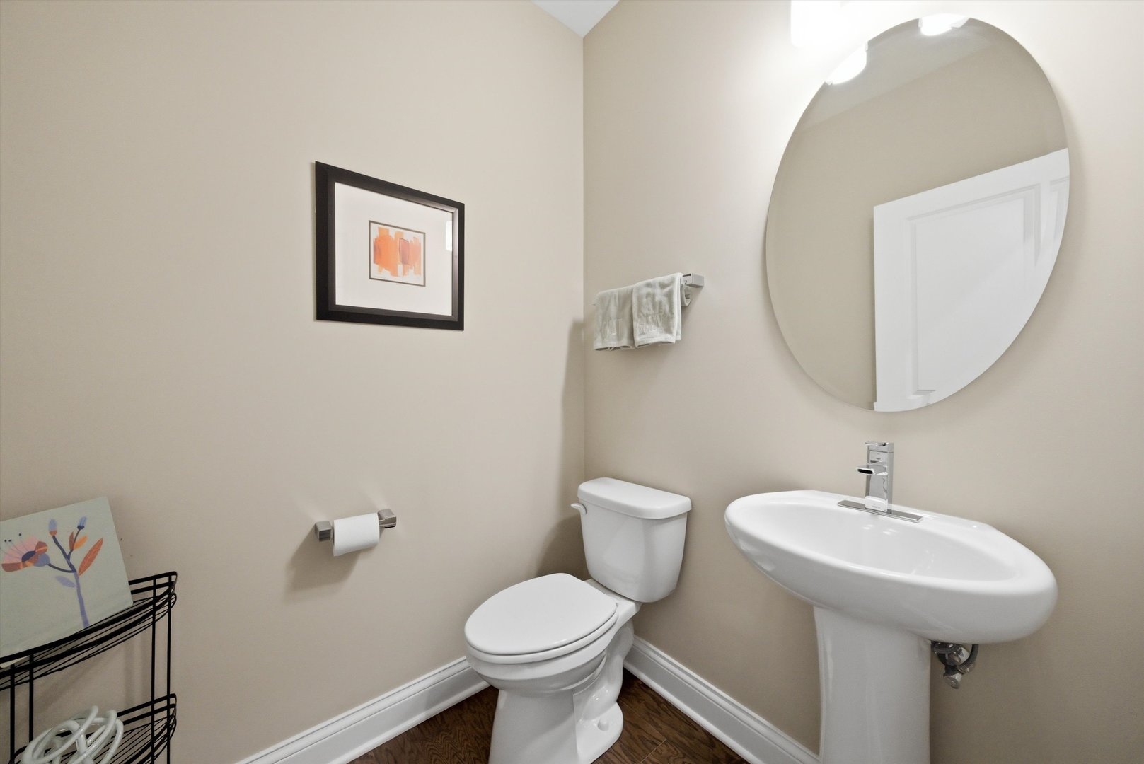 76 Somerset Circle Wheaton, IL 60189 - Photo 28 of 40 a bathroom with a toilet sink and mirror