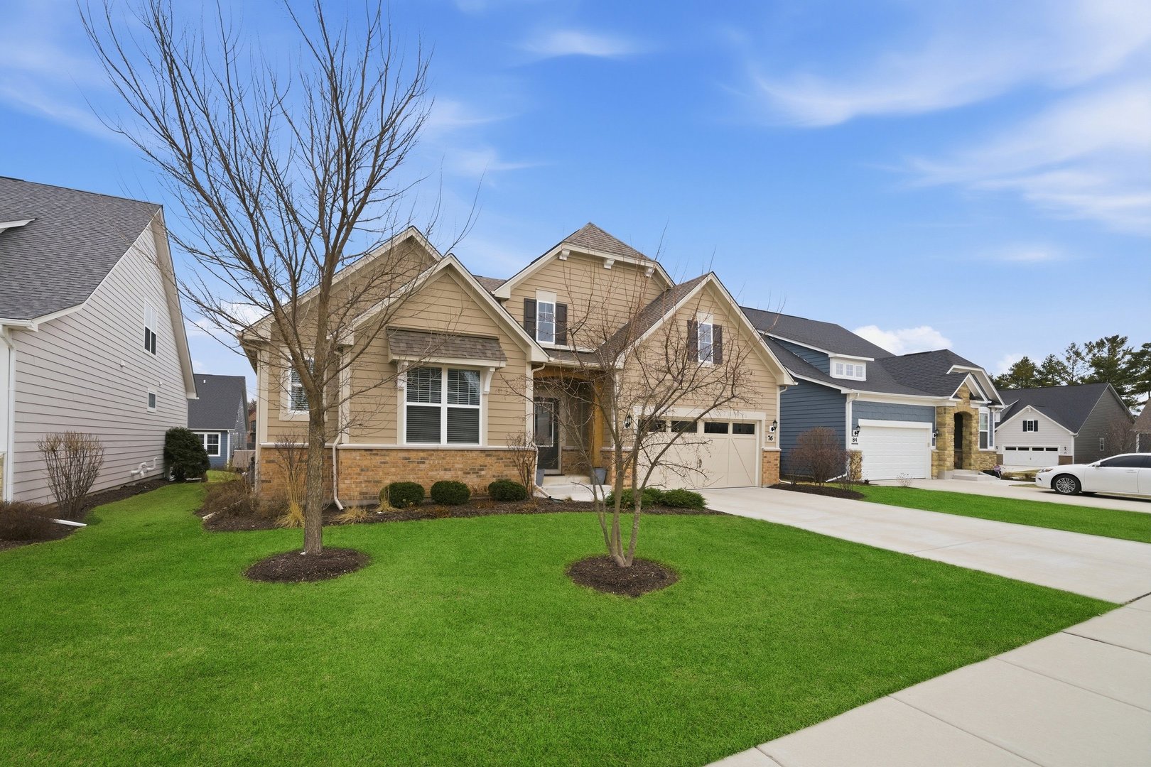 76 Somerset Circle Wheaton, IL 60189 - Photo 39 of 40 a front view of house with yard and green space