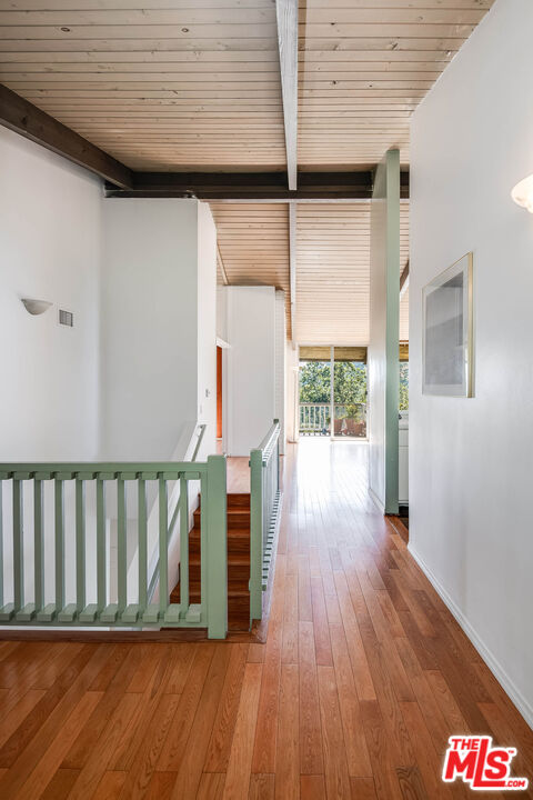 3557 Serra Road Malibu, CA 90265 - Photo 2 of 32 a view of entryway with wooden floor