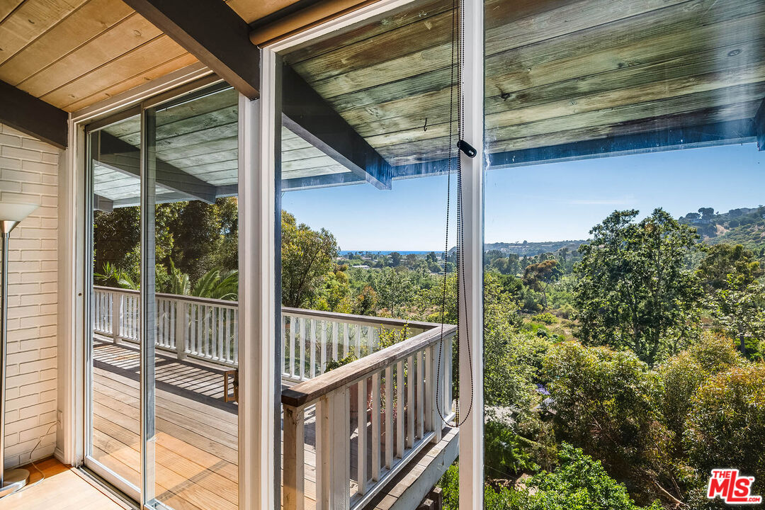 3557 Serra Road Malibu, CA 90265 - Photo 6 of 32 a view of a balcony