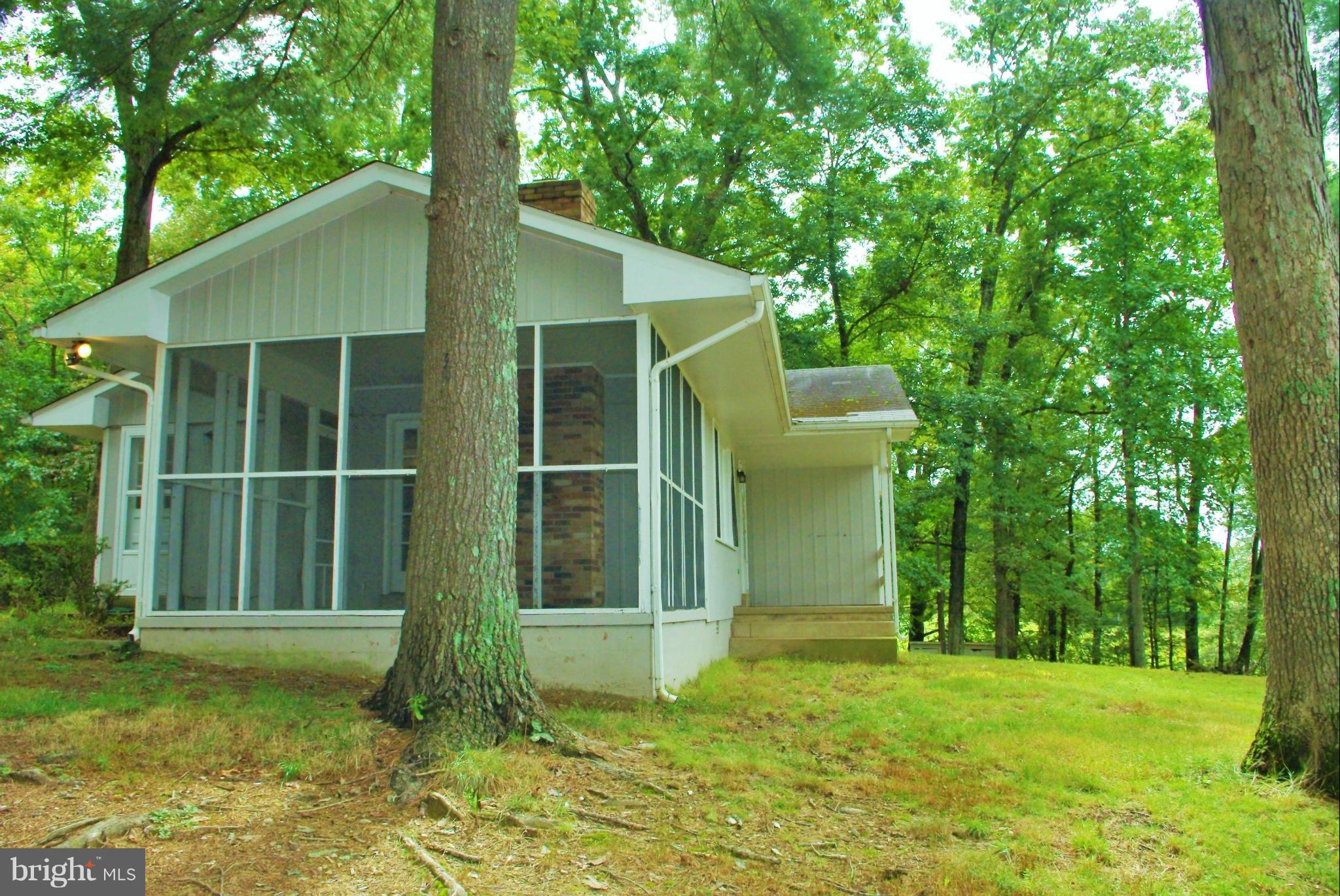 353 Aaron Mountain Road Castleton, VA 22716 - Photo 13 of 23 Large screened porch perfect for summer dinners