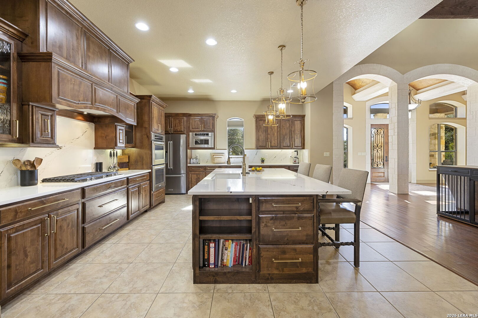 1941 Canyon Spring Branch, TX 78070 - Photo 18 of 86 a kitchen with a table chairs sink and cabinets