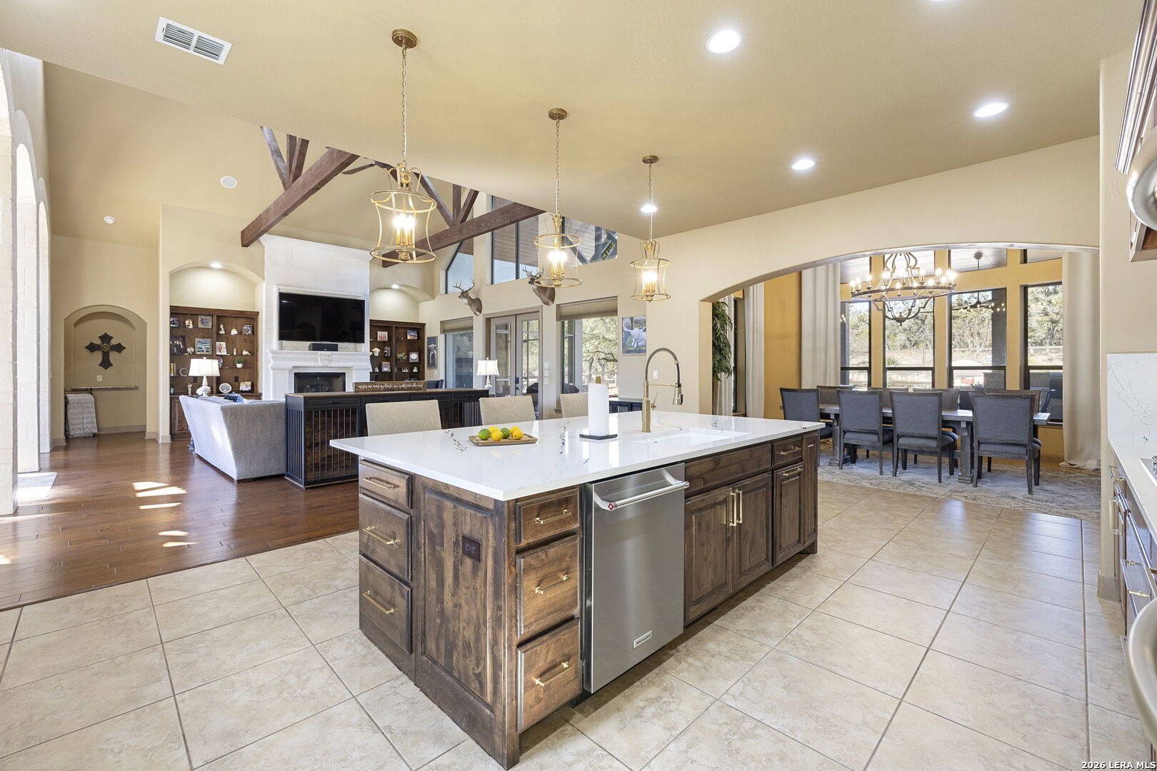 1941 Canyon Spring Branch, TX 78070 - Photo 21 of 86 a large kitchen with kitchen island a large counter top stainless steel appliances and cabinets