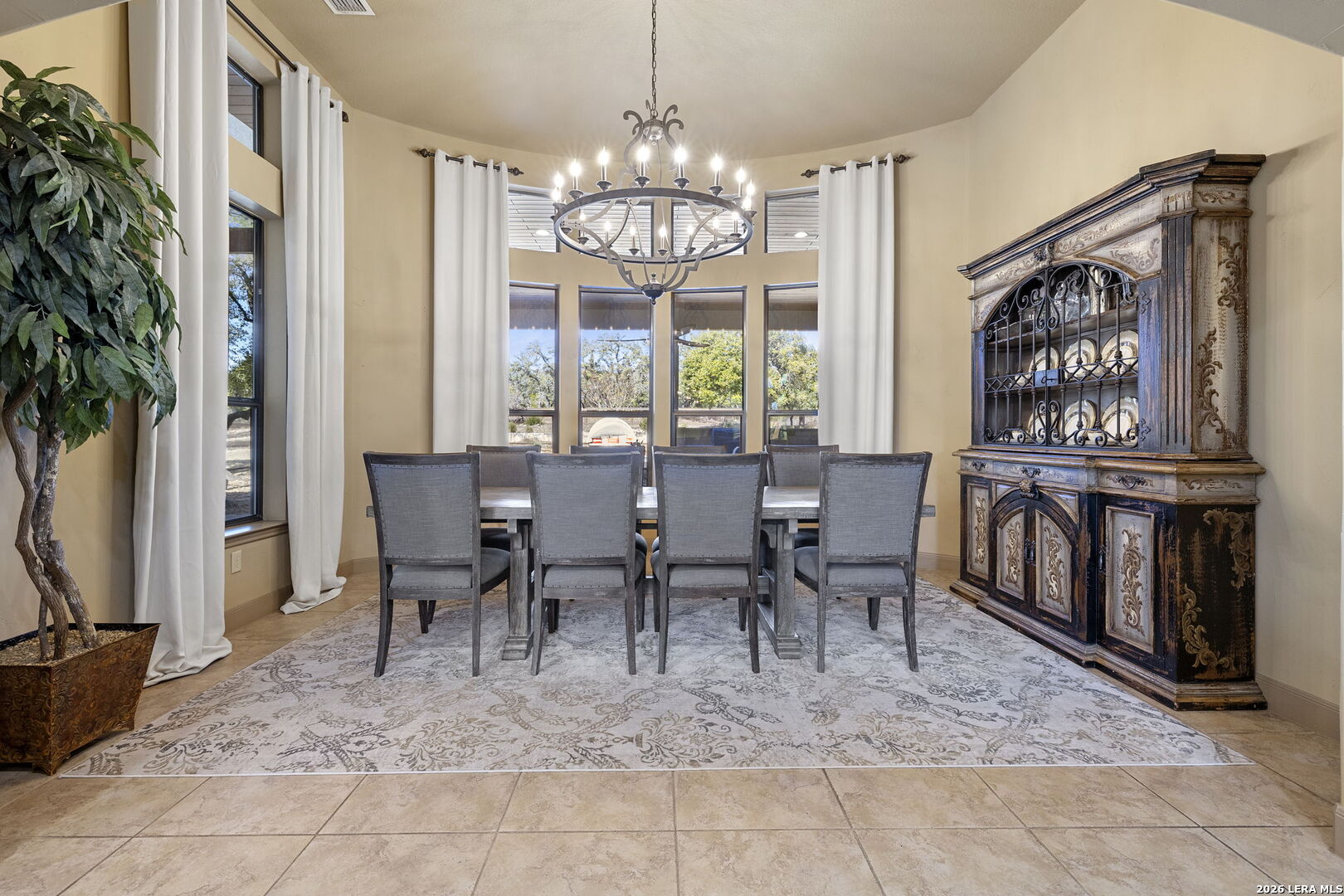 1941 Canyon Spring Branch, TX 78070 - Photo 22 of 86 a view of a dining room with furniture window and outside view