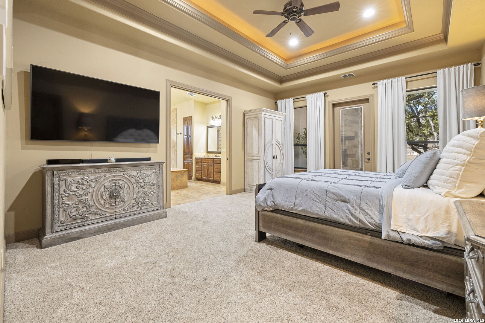 1941 Canyon Spring Branch, TX 78070 - Photo 25 of 86 a living room with a flat screen tv and a fireplace
