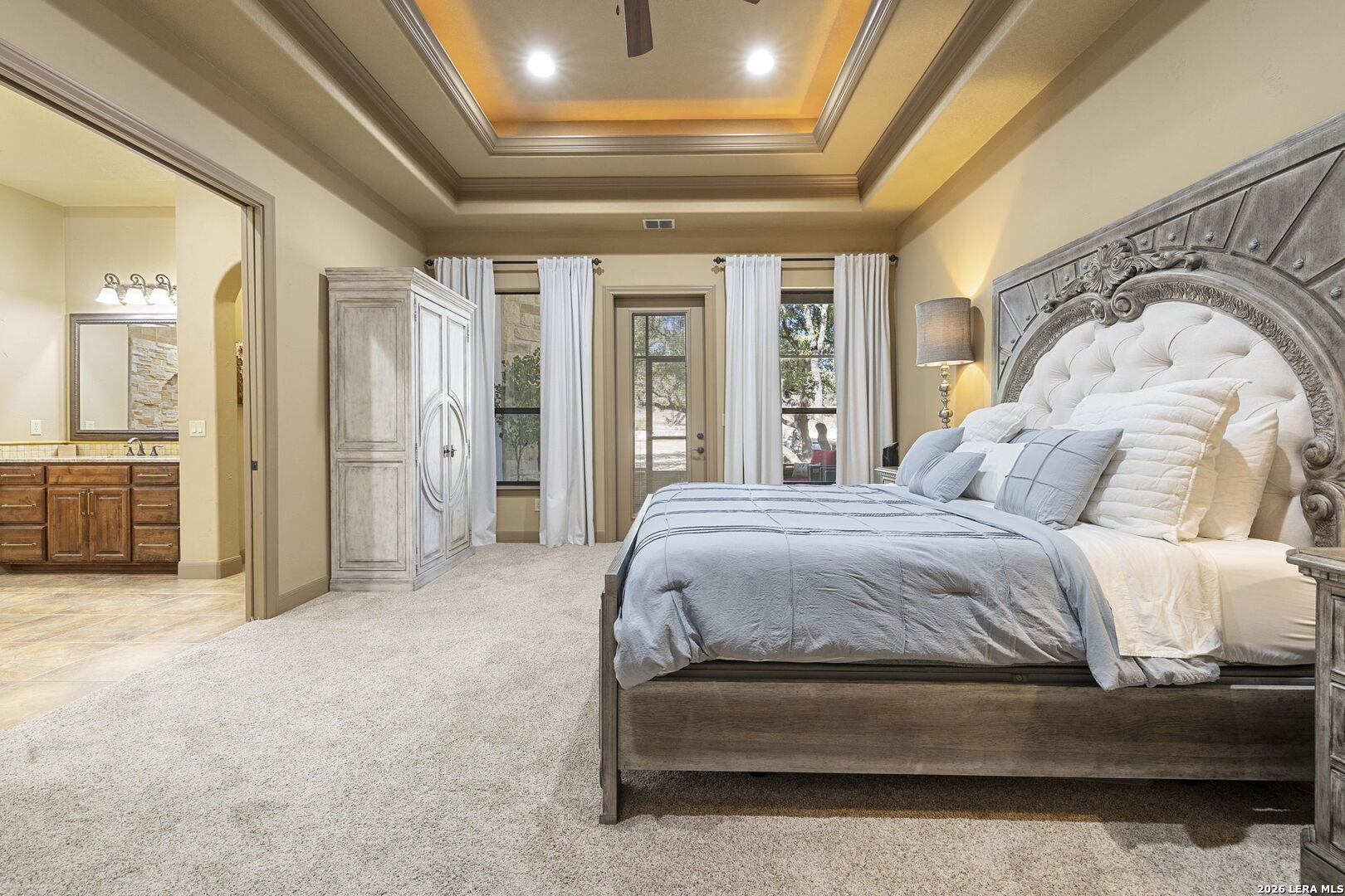 1941 Canyon Spring Branch, TX 78070 - Photo 26 of 86 a spacious bedroom with a bed and glass door