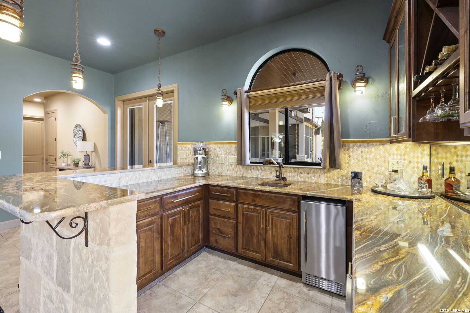 1941 Canyon Spring Branch, TX 78070 - Photo 33 of 86 a bathroom with a granite countertop sink a large mirror and a vanity