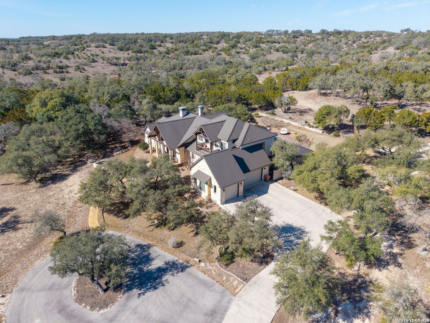 1941 Canyon Spring Branch, TX 78070 - Photo 74 of 86 an aerial view of a house with a yard