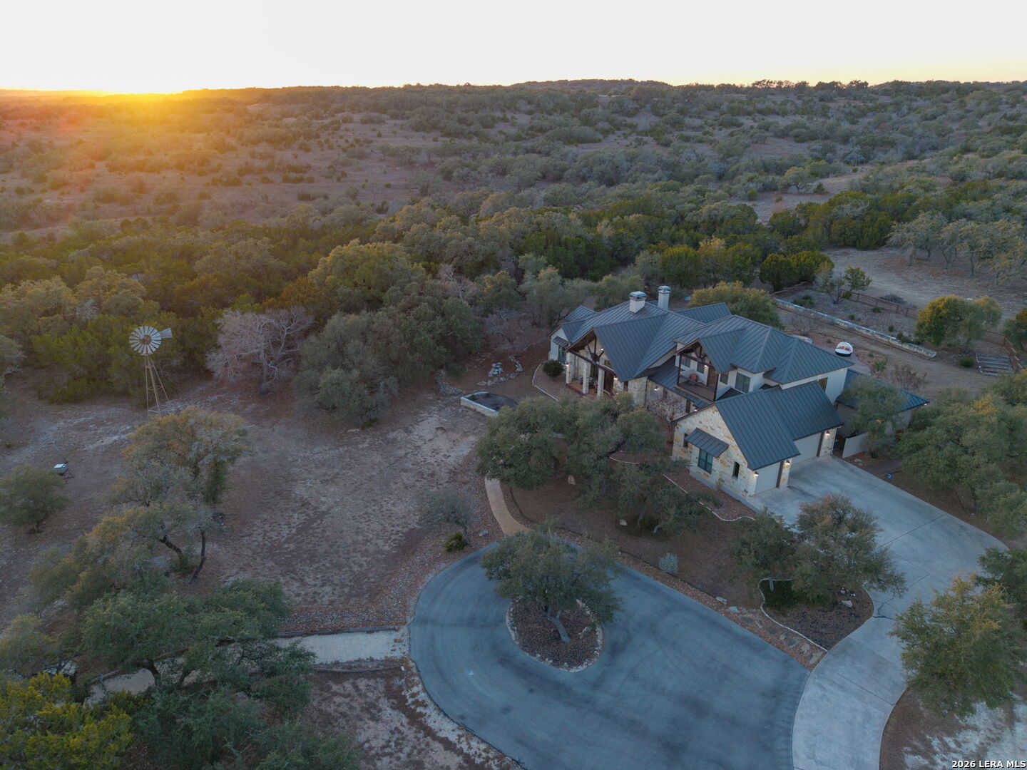 1941 Canyon Spring Branch, TX 78070 - Photo 75 of 86 an aerial view of a house with a yard