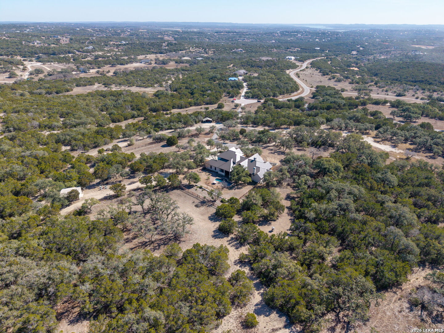 1941 Canyon Spring Branch, TX 78070 - Photo 80 of 86 an aerial view of house with yard and mountain view