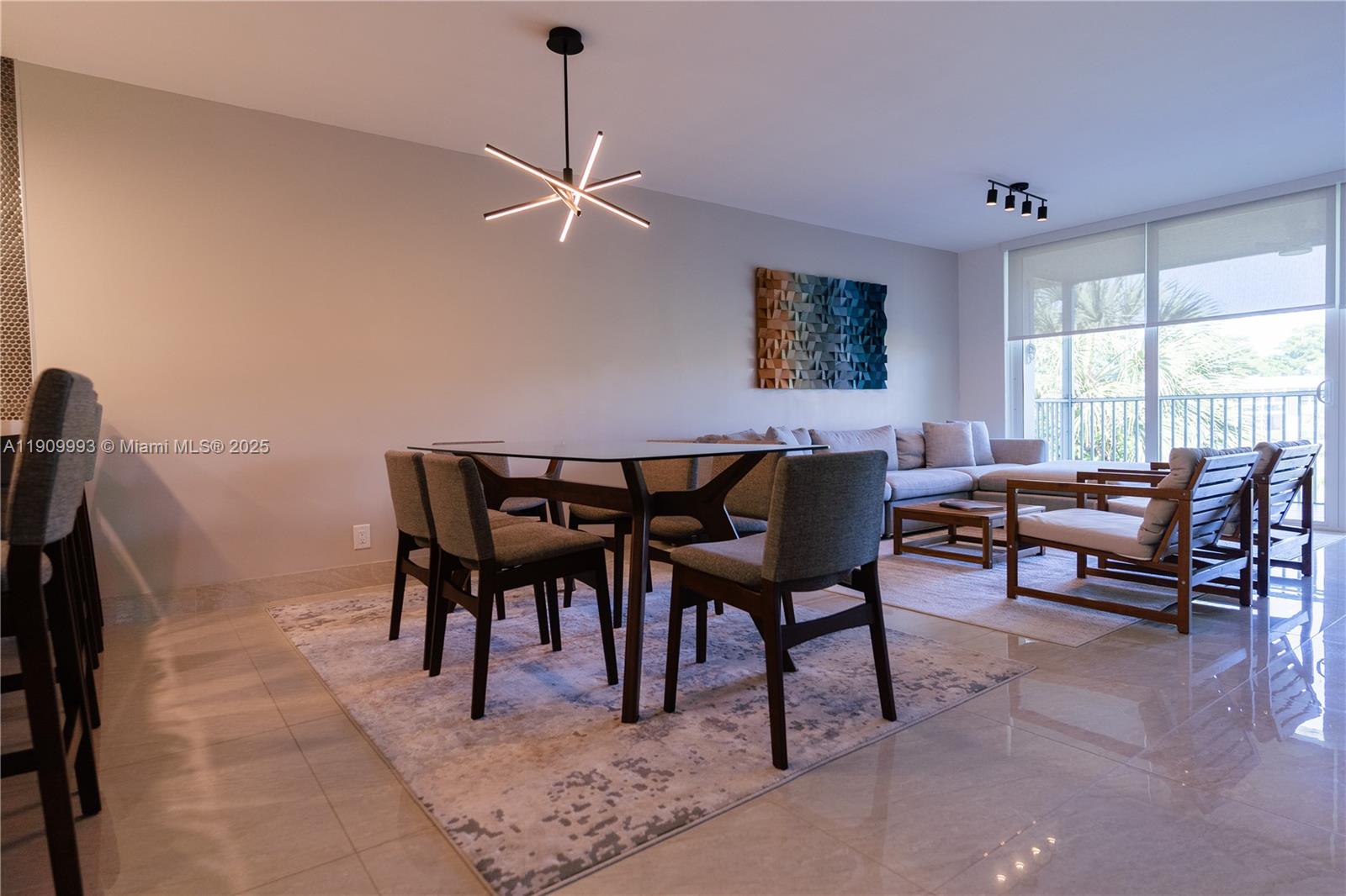 4017 North Cypress Drive, Unit 201 Pompano Beach, FL 33069 - Photo 11 of 44 a view of a dining room with furniture