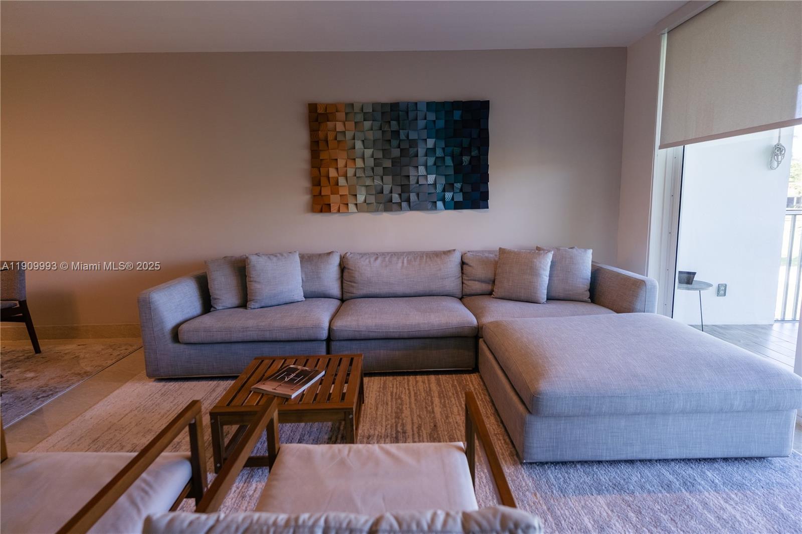 4017 North Cypress Drive, Unit 201 Pompano Beach, FL 33069 - Photo 13 of 44 a bedroom with a bed and a couch