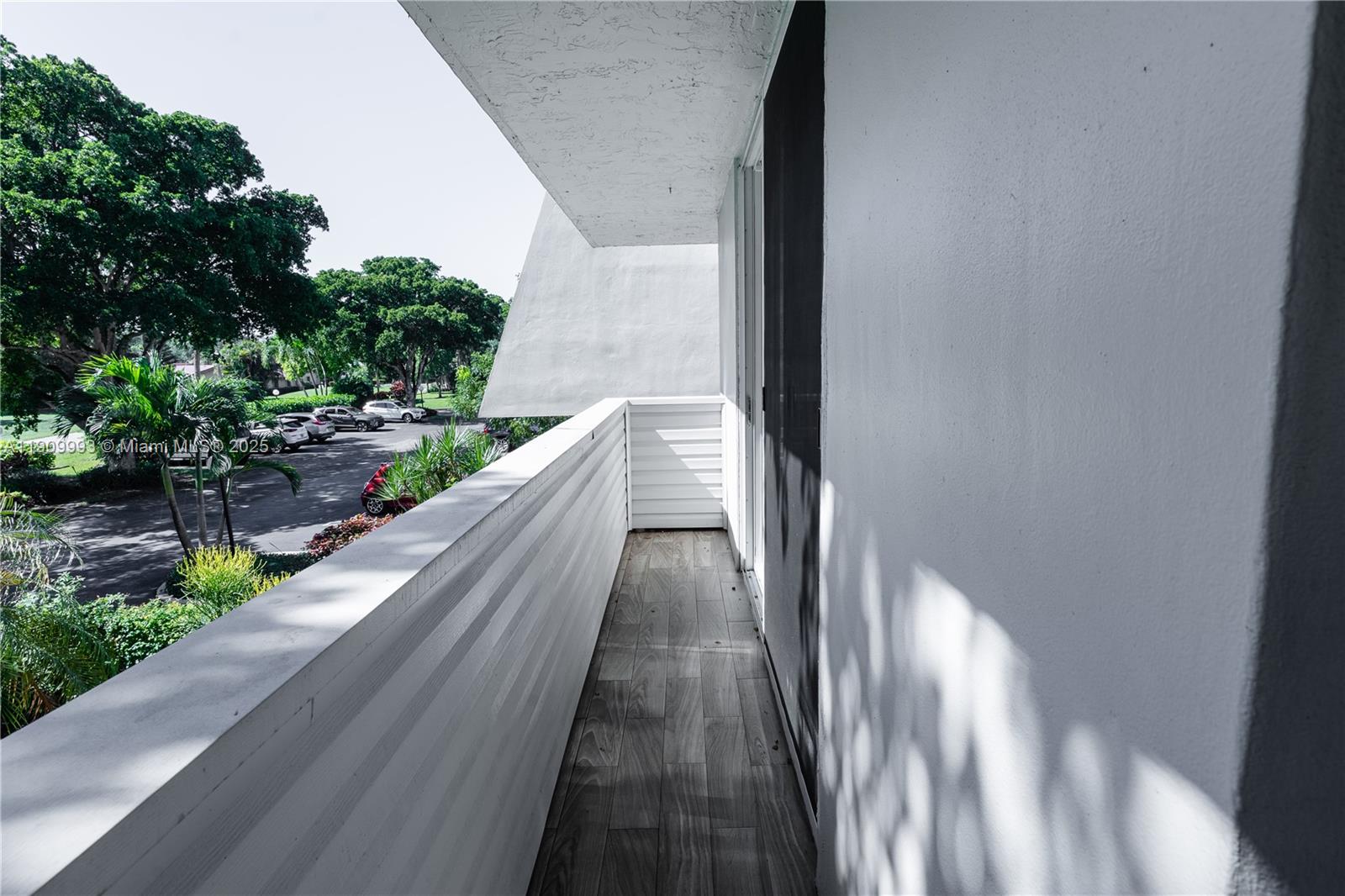 4017 North Cypress Drive, Unit 201 Pompano Beach, FL 33069 - Photo 22 of 44 a view of balcony and yard