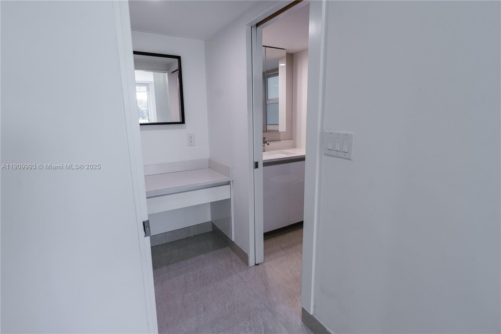 4017 North Cypress Drive, Unit 201 Pompano Beach, FL 33069 - Photo 25 of 44 a view of a room that has a bed in it