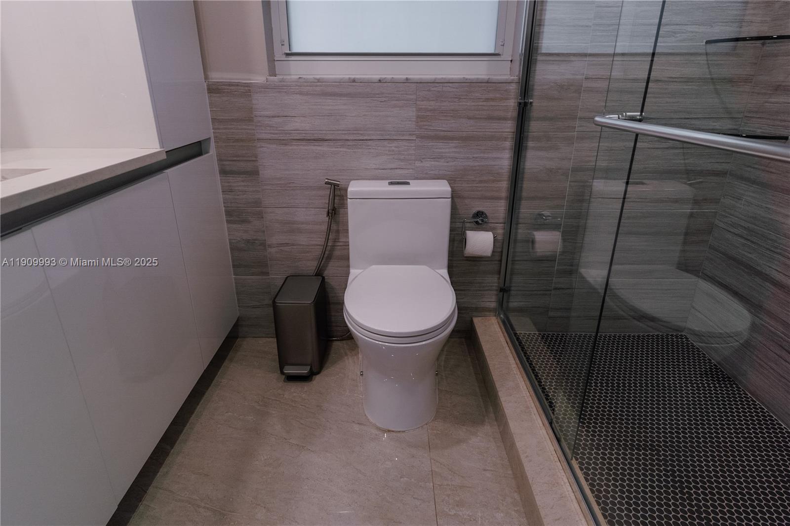 4017 North Cypress Drive, Unit 201 Pompano Beach, FL 33069 - Photo 27 of 44 a bathroom with a toilet