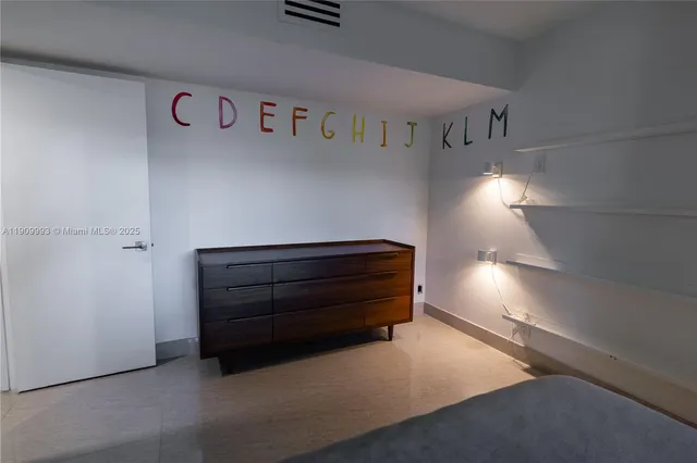 a room with a book shelf