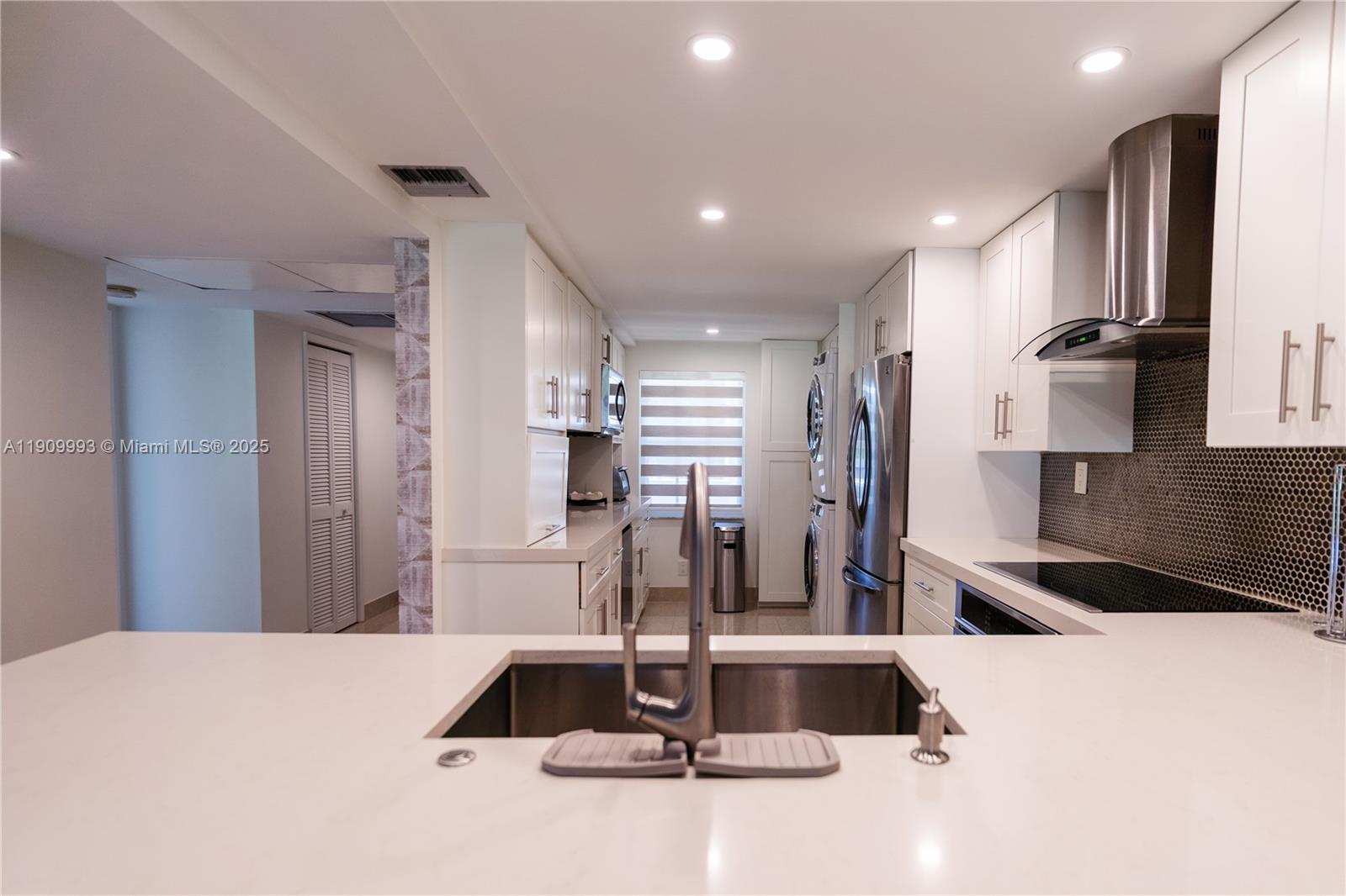 4017 North Cypress Drive, Unit 201 Pompano Beach, FL 33069 - Photo 4 of 44 a view of a kitchen with a sink