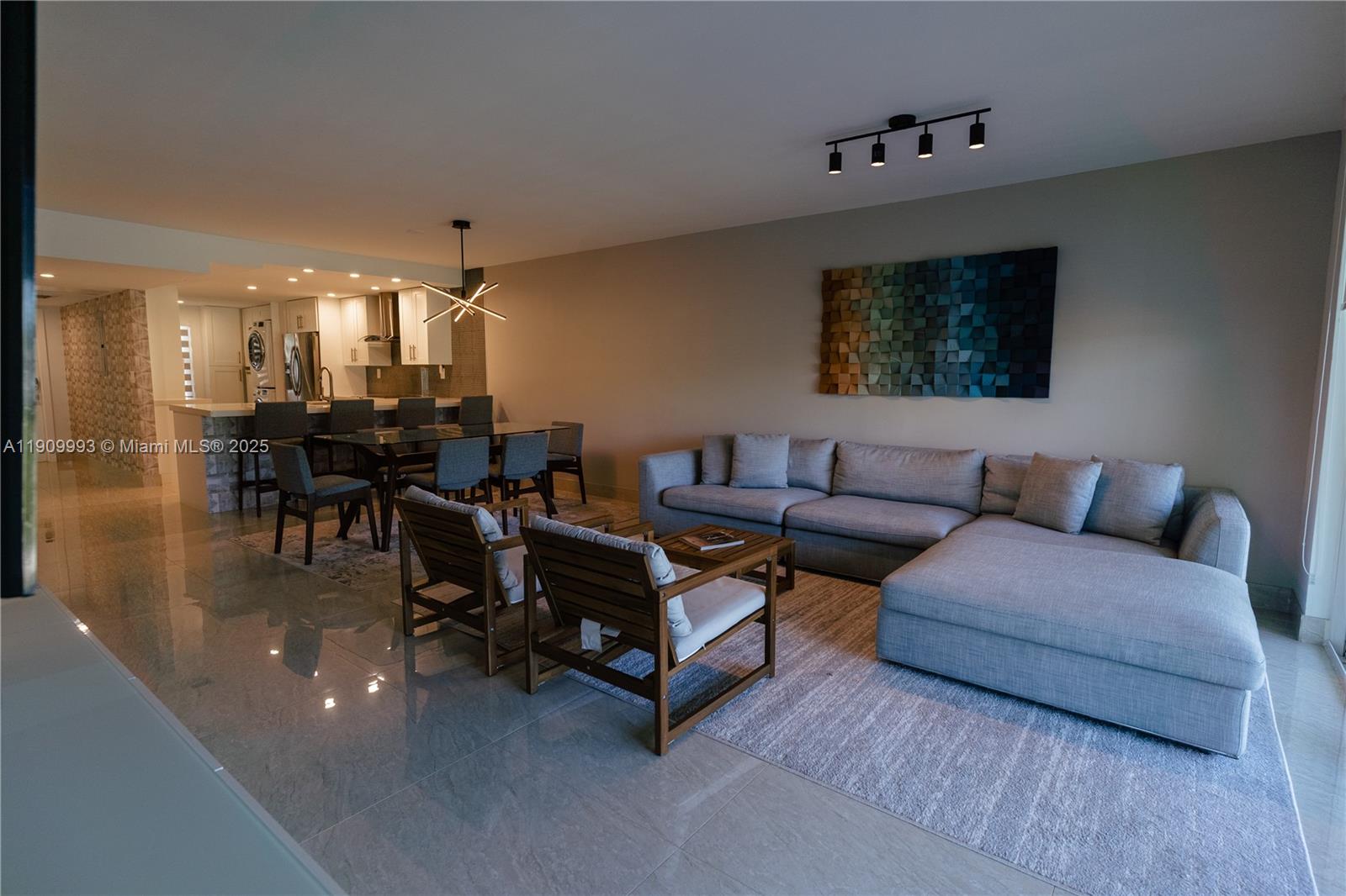 4017 North Cypress Drive, Unit 201 Pompano Beach, FL 33069 - Photo 42 of 44 a living room with furniture and wooden floor