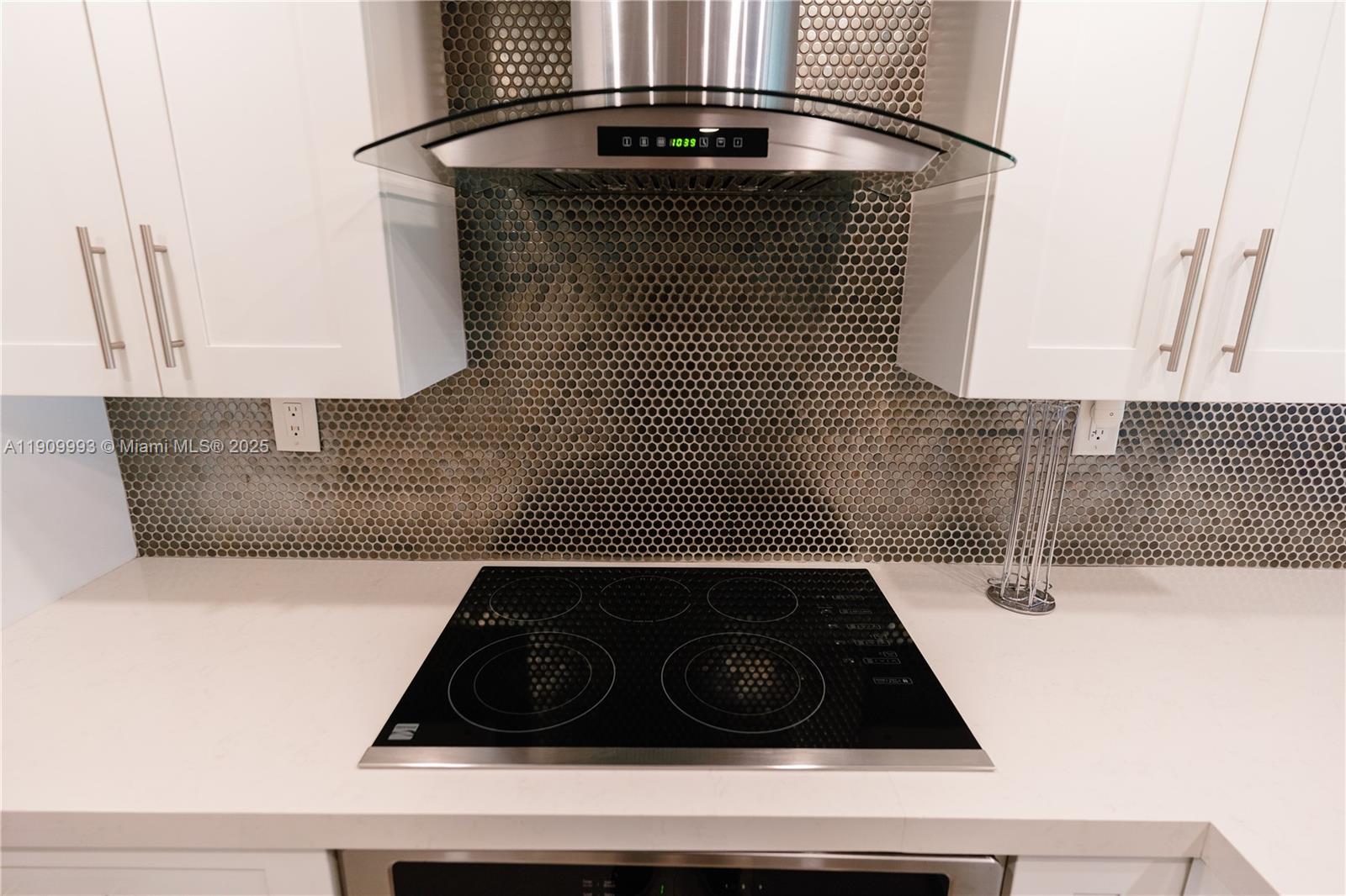 4017 North Cypress Drive, Unit 201 Pompano Beach, FL 33069 - Photo 5 of 44 a bathroom with a granite countertop sink