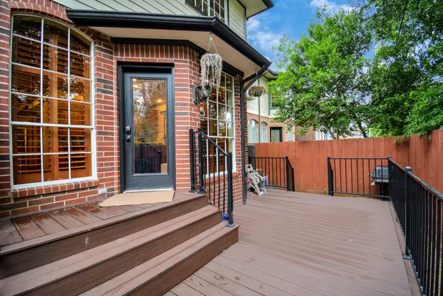 a front view of a house with a large window