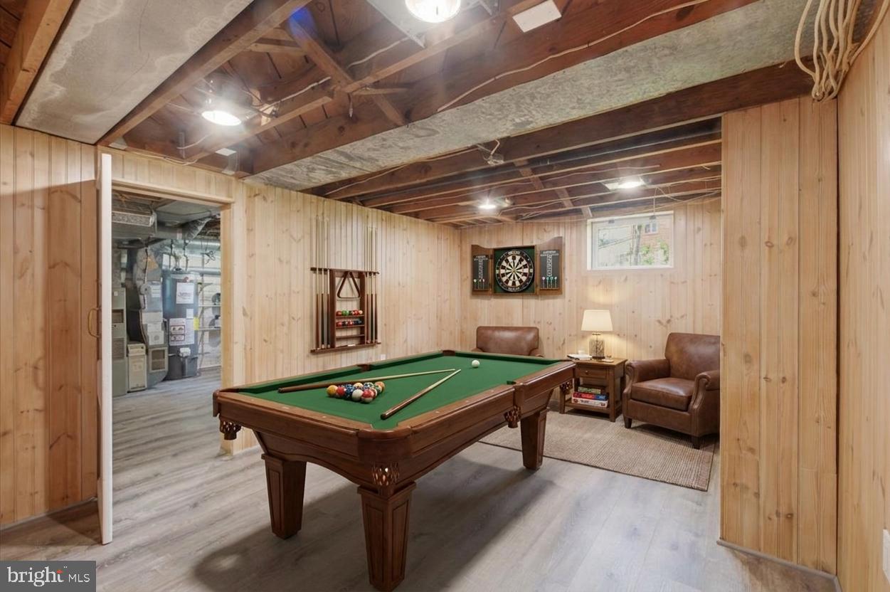 5736 8th Road North Arlington, VA 22205 - Photo 9 of 57 Basement rec room (virtually staged)