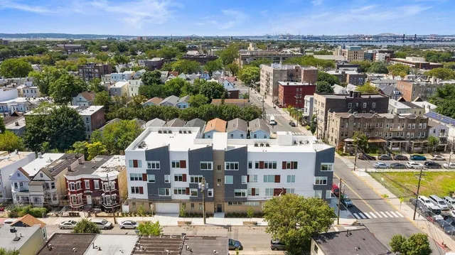 a view of city with tall buildings