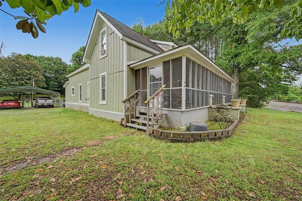 483 Coal Road Northwest Resaca, GA 30735 - Photo 6 of 56 a view of a house with a yard