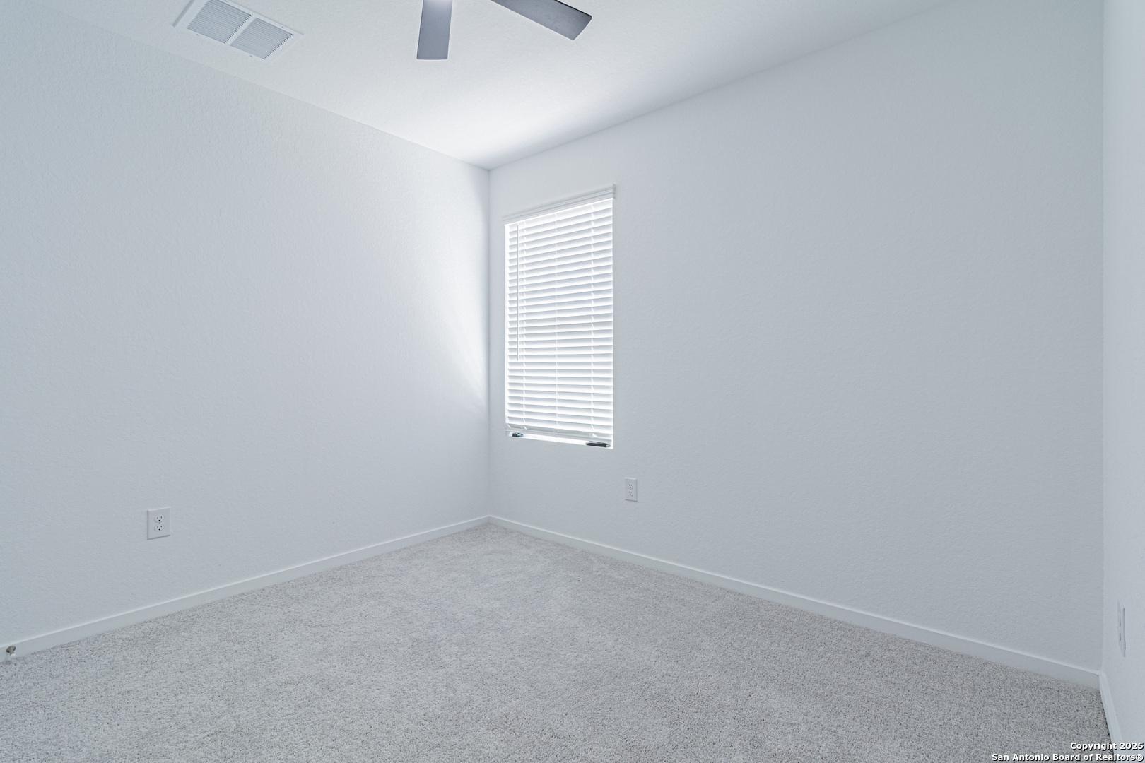 14610 Kayden Ridge San Antonio, TX 78253 - Photo 11 of 35 an empty room with windows
