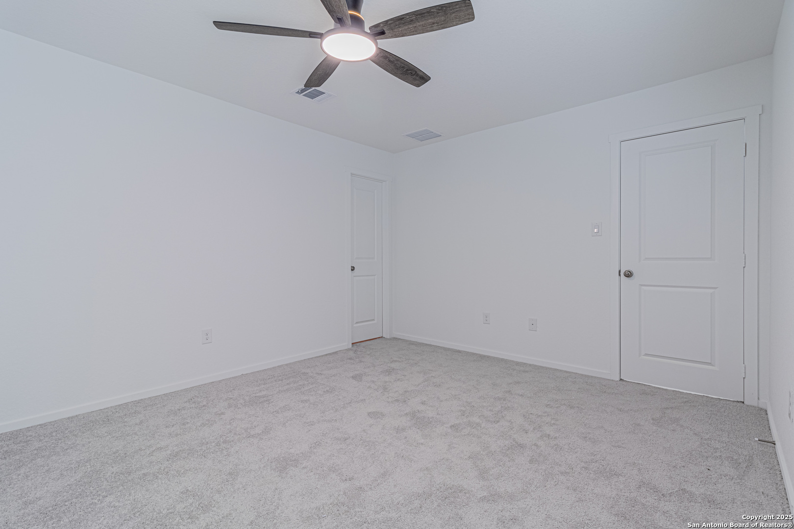 14610 Kayden Ridge San Antonio, TX 78253 - Photo 28 of 35 an empty room with a fan & a window