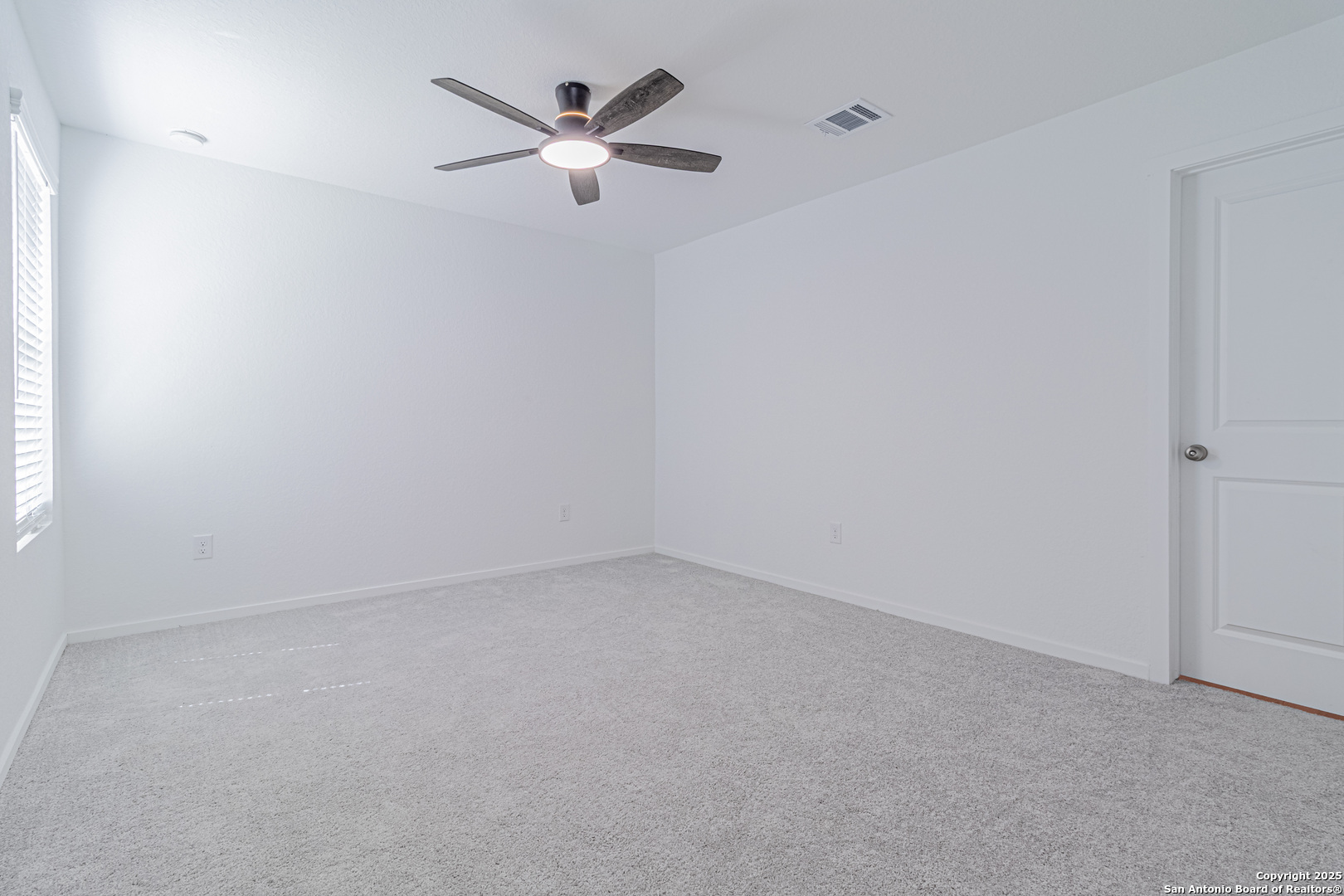 14610 Kayden Ridge San Antonio, TX 78253 - Photo 30 of 35 an empty room with a fan