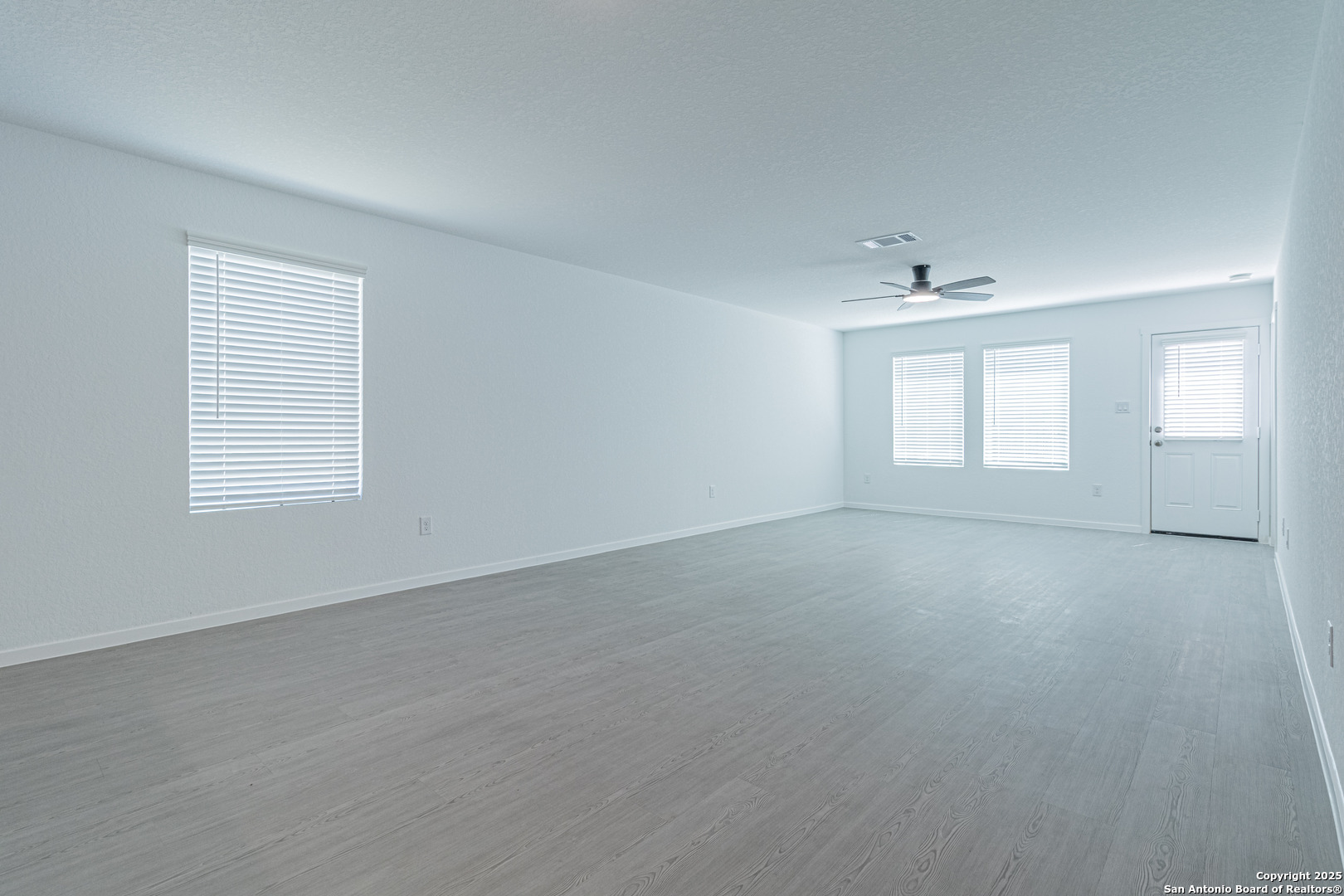 14610 Kayden Ridge San Antonio, TX 78253 - Photo 33 of 35 an empty room with windows and closet