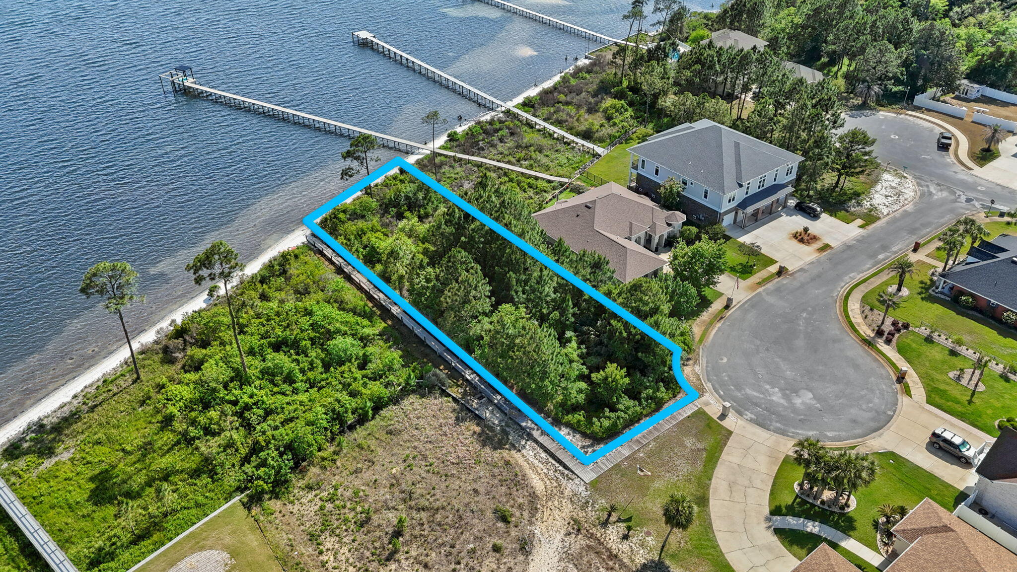 7475 Soundshore Drive Navarre, FL 32566 - Photo 11 of 35 an aerial view of a house