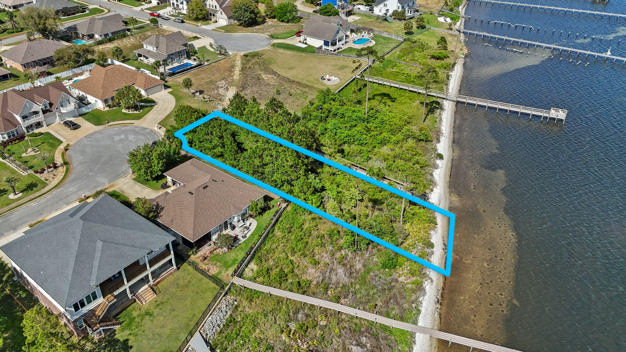 7475 Soundshore Drive Navarre, FL 32566 - Photo 19 of 35 an aerial view of a house