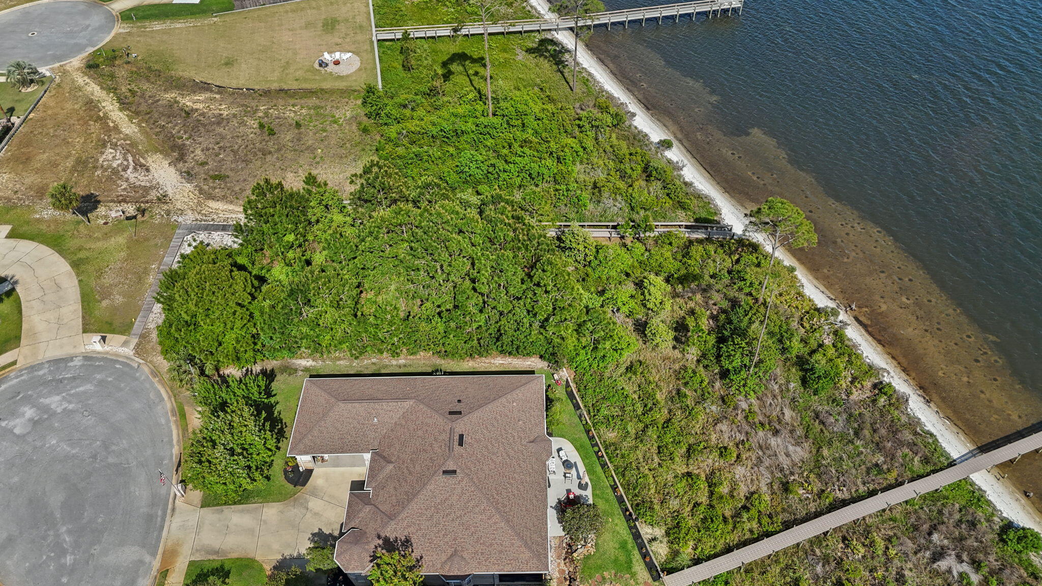7475 Soundshore Drive Navarre, FL 32566 - Photo 22 of 35 view of a yard
