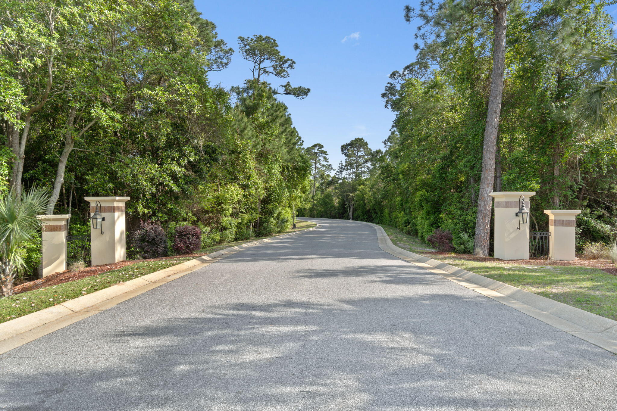 7475 Soundshore Drive Navarre, FL 32566 - Photo 6 of 35 a view of a street with a building in the background
