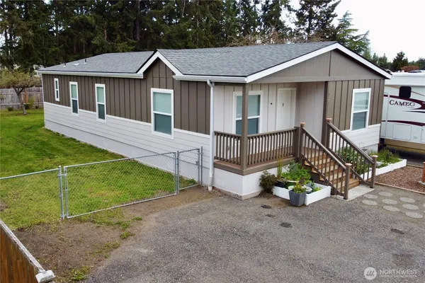 a front view of a house with porch