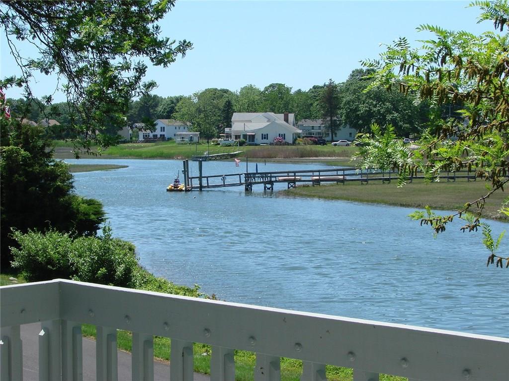 a view of a swimming pool with a yard