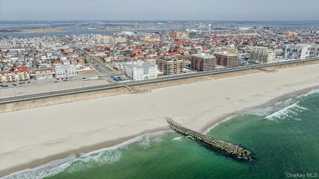 an aerial view of houses with outdoor space