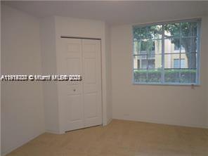777 Southwest 111th Way, Unit 104 Pembroke Pines, FL 33025 - Photo 12 of 20 an empty room with window