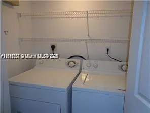 a view of a kitchen with a sink