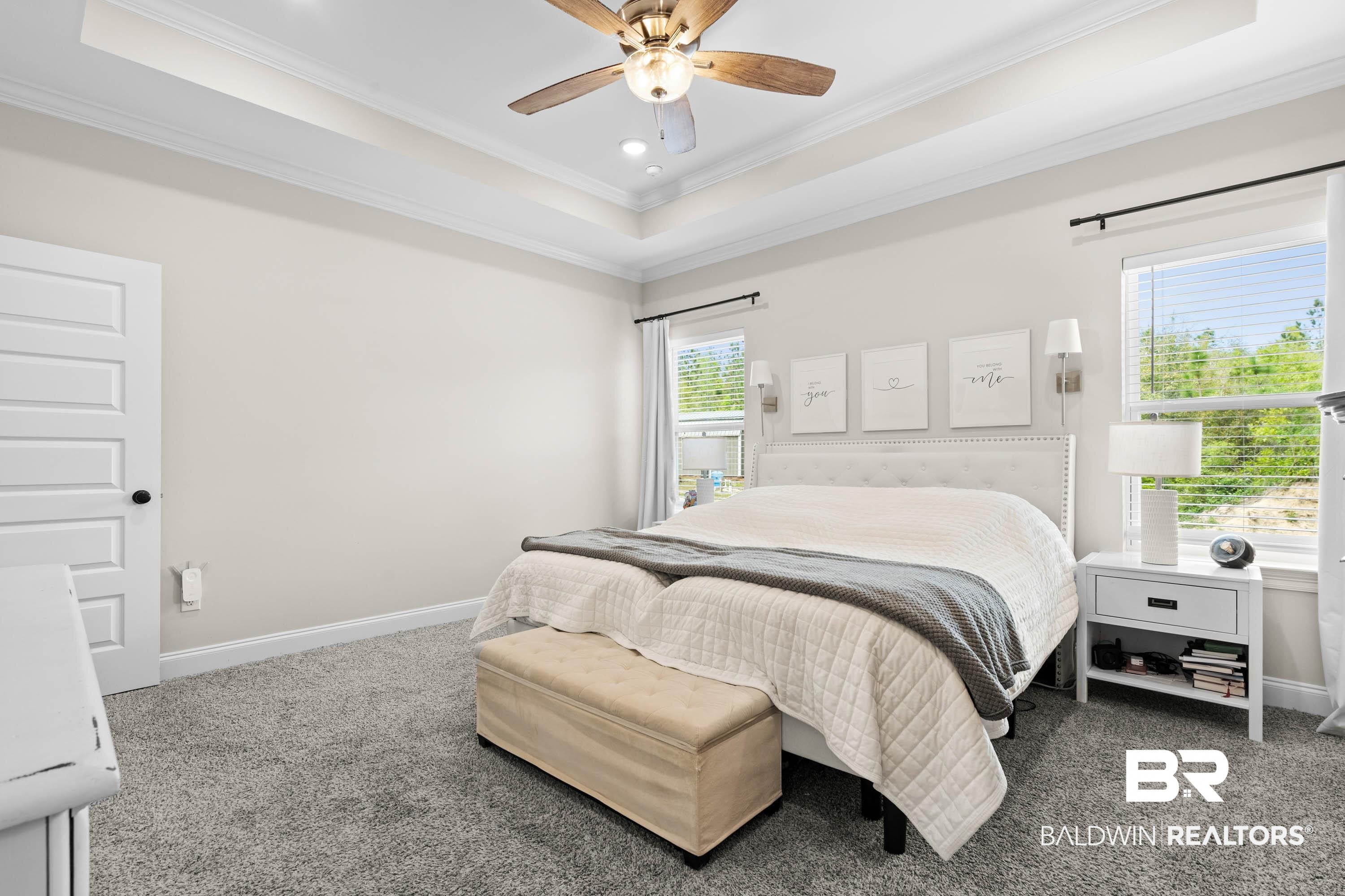 7150 Powell Road, Unit LOT 6A Eight Mile, AL 36613 - Photo 12 of 35 Bedroom featuring a raised ceiling, ornamental molding, carpet, a ceiling fan, and recessed lighting