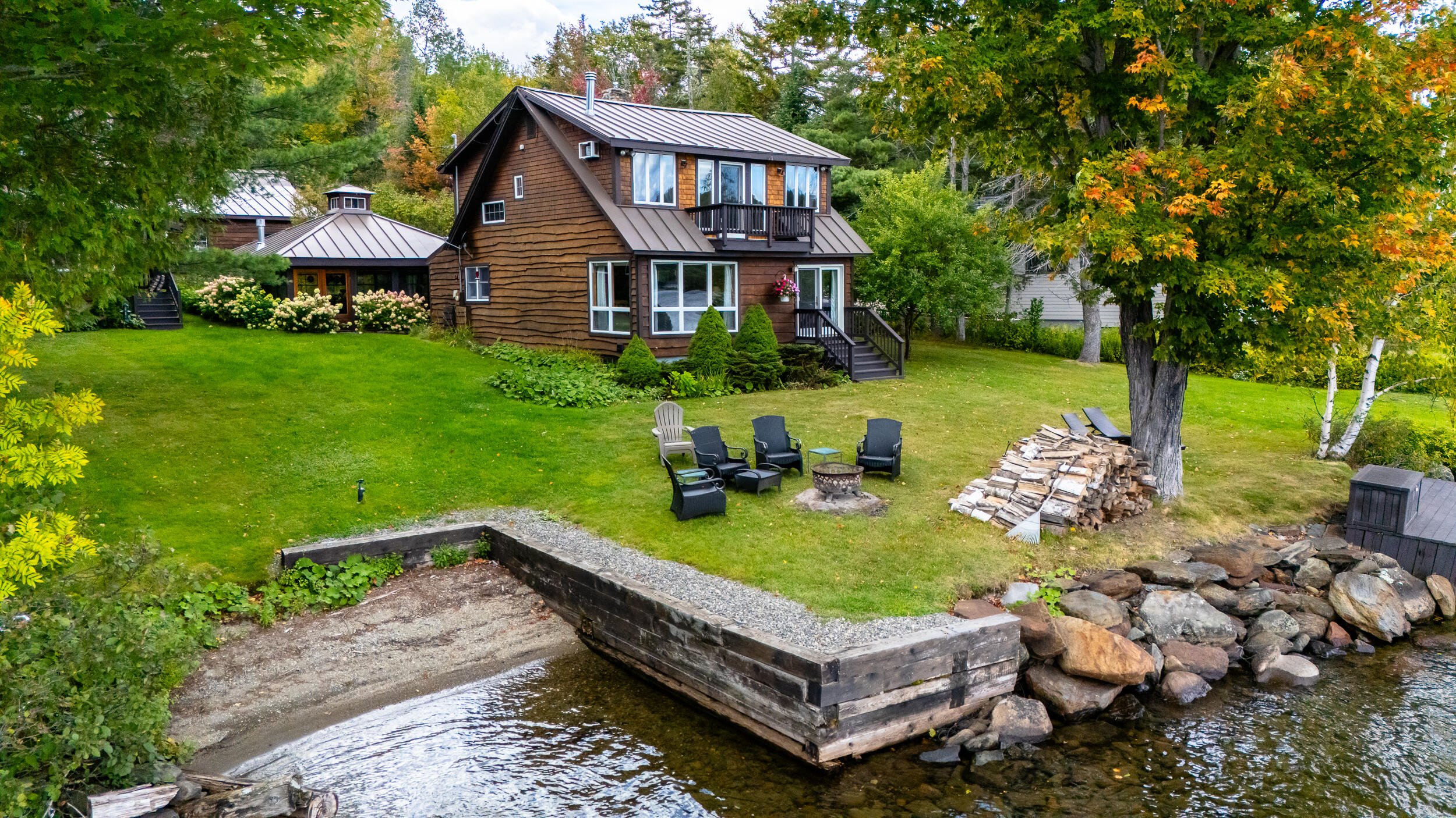 188 Rumford Road Rangeley, ME 04964 - Photo 1 of 64 DJI_20260910143349_0181_D