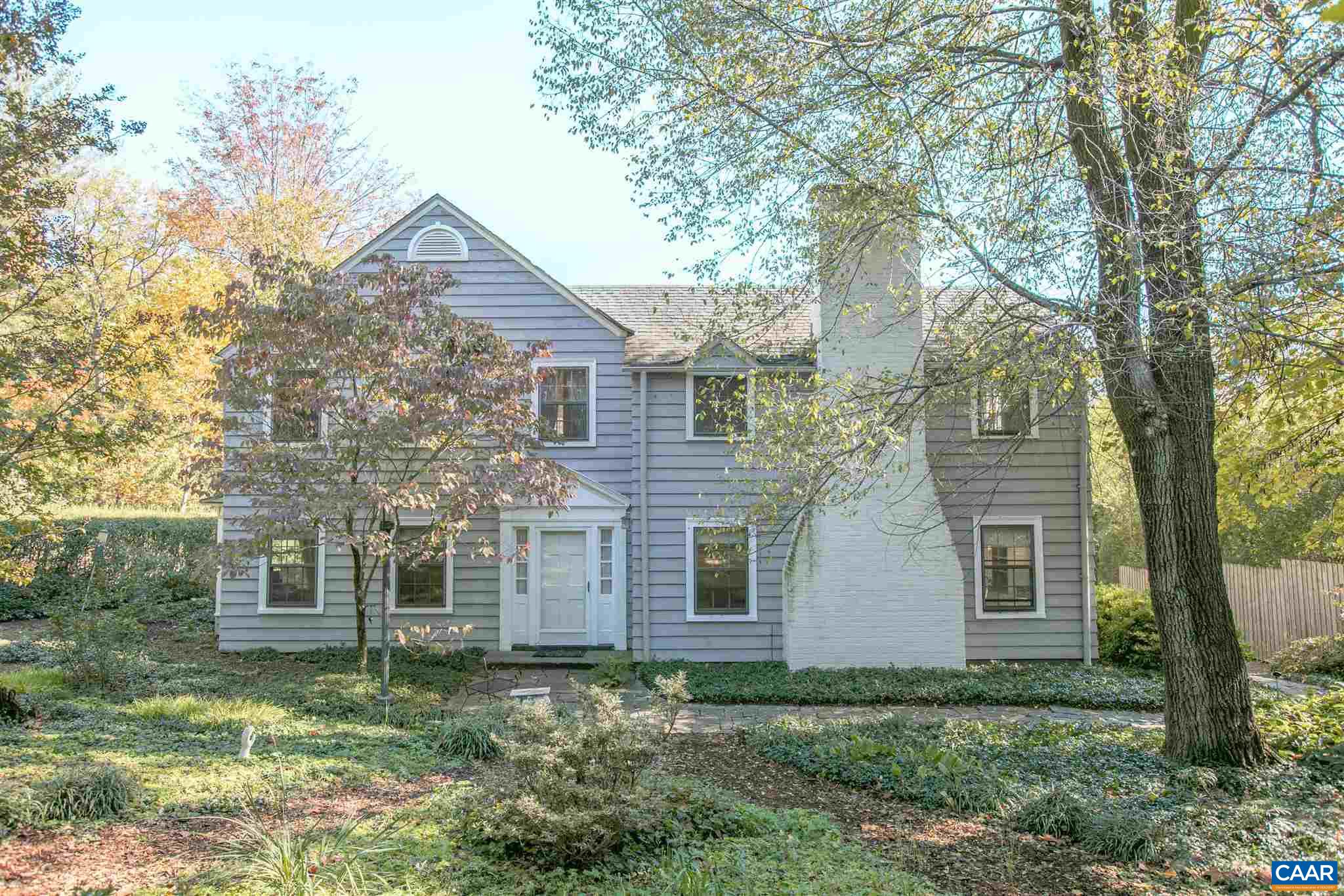 1102 Rugby Road Charlottesville, VA 22903 - Photo 1 of 51 front view of a house with a yard