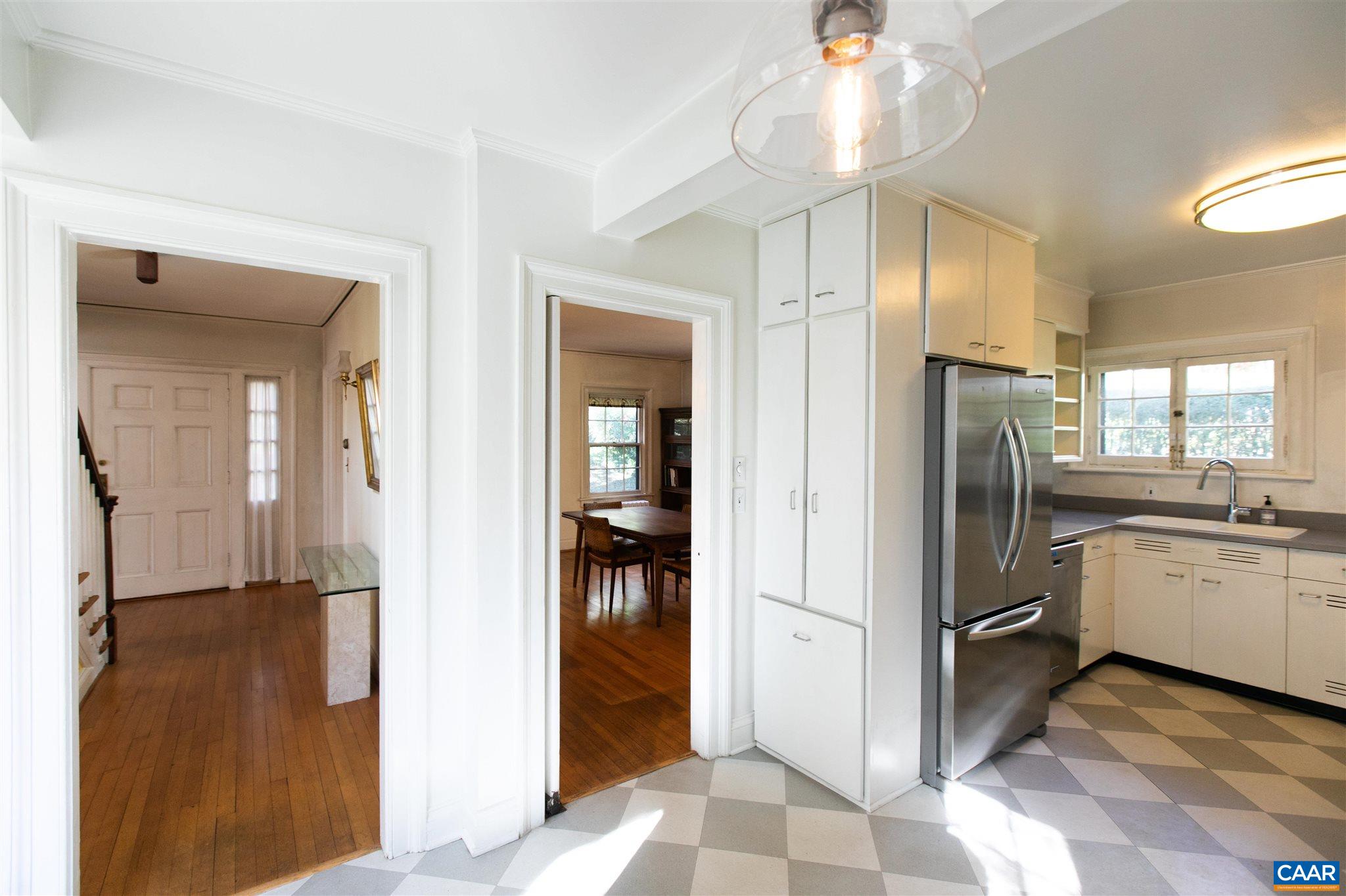 1102 Rugby Road Charlottesville, VA 22903 - Photo 19 of 51 a kitchen with a refrigerator and a sink