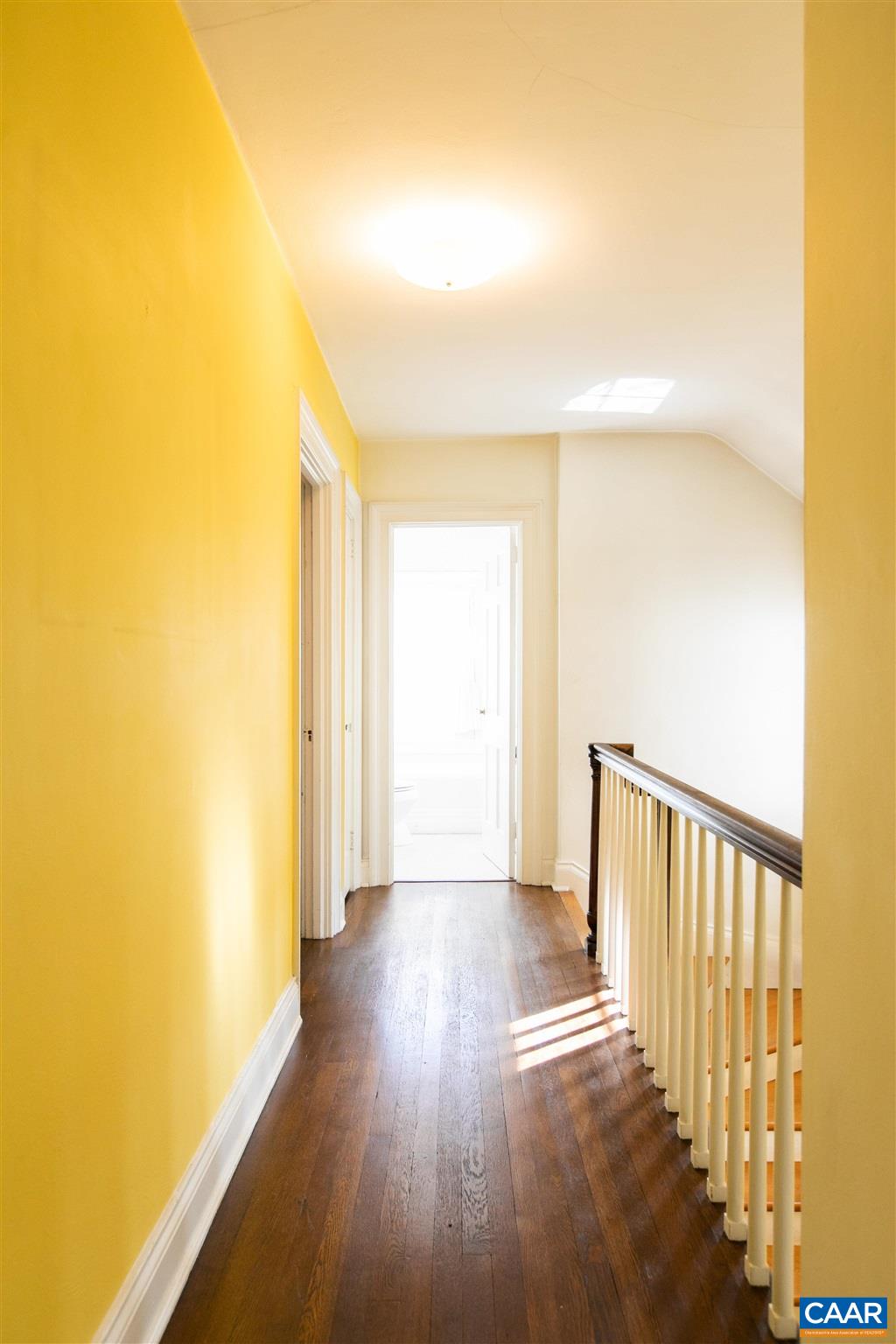 1102 Rugby Road Charlottesville, VA 22903 - Photo 29 of 51 a view of a hallway with wooden floor