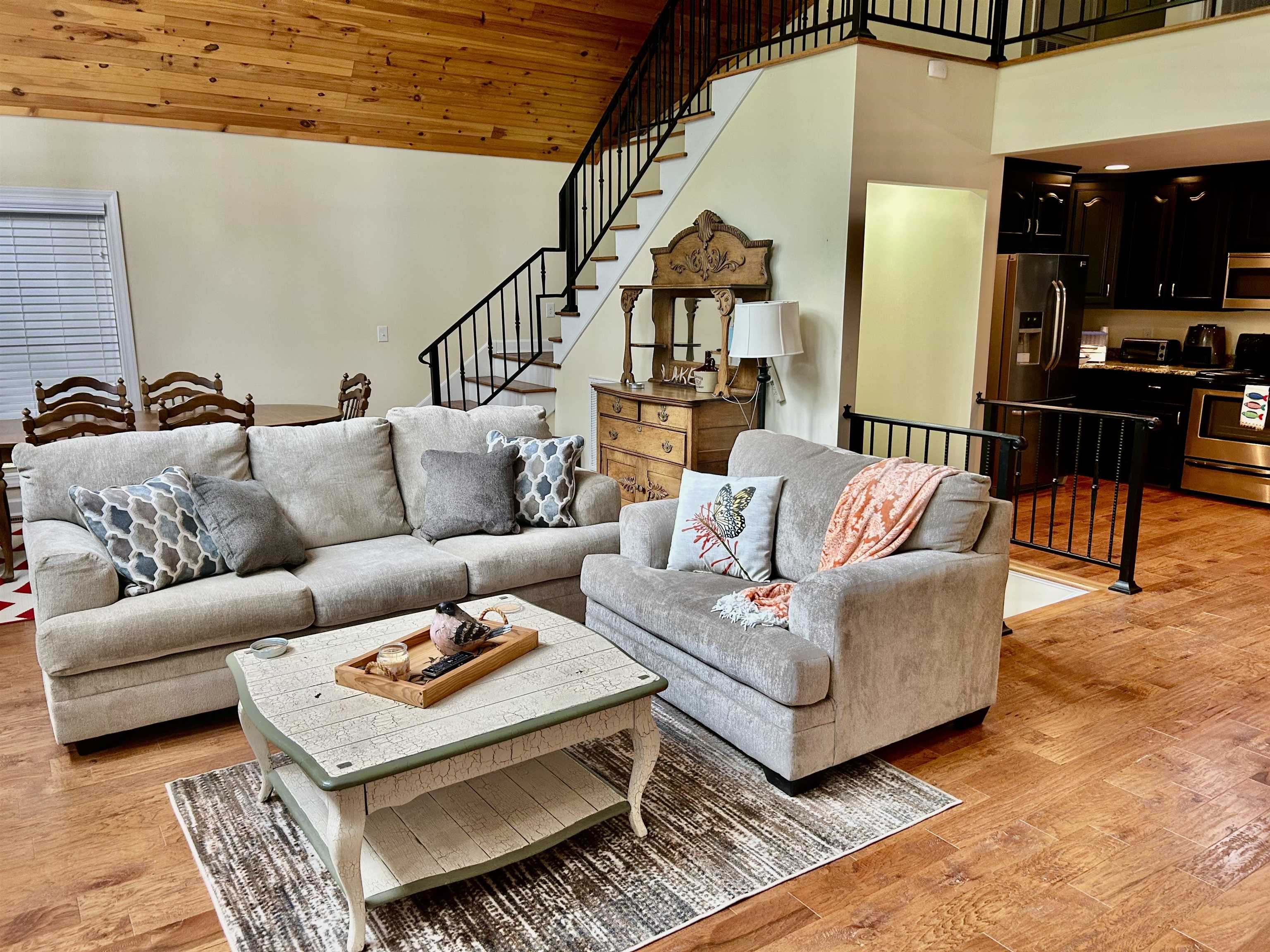 42 Cr 329 Road Iuka, MS 38852 - Photo 5 of 32 Living room with lofted ceiling, stairs, light wood finished floors, and wooden ceiling