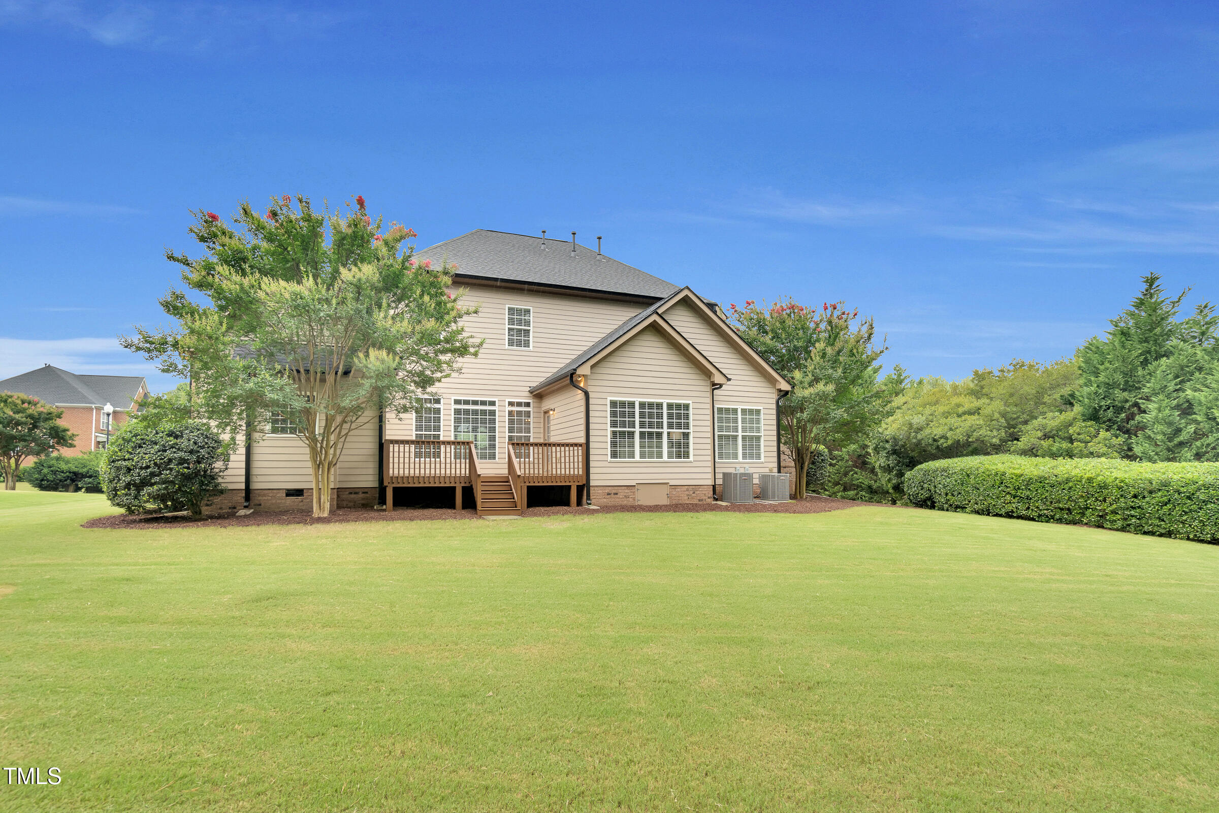 216 Creststone Drive Cary, NC 27519 - Photo 18 of 19 a view of a house with a yard