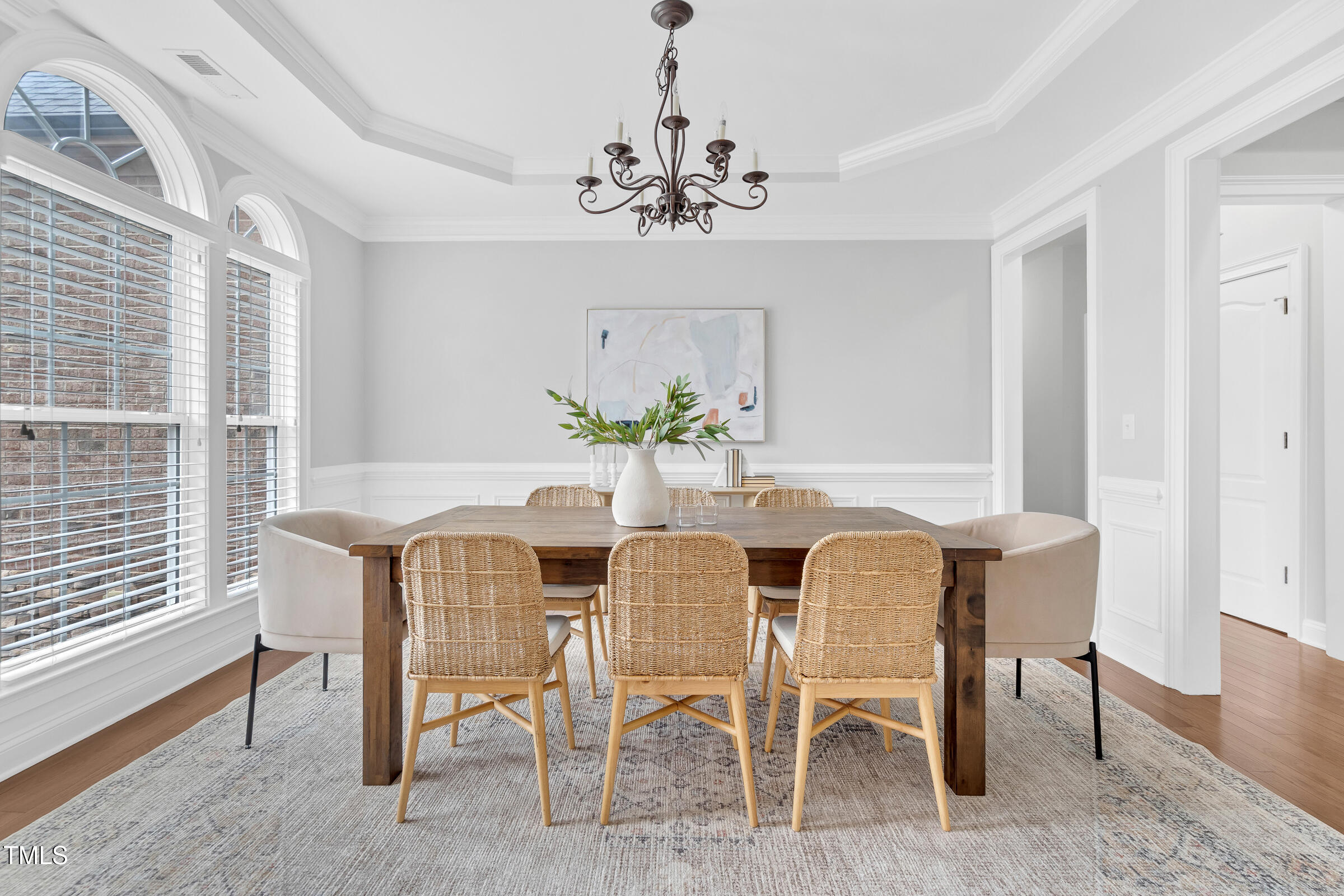 216 Creststone Drive Cary, NC 27519 - Photo 6 of 19 a view of a dining room with furniture window and wooden floor